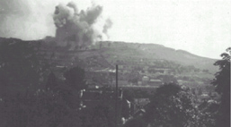 German FLAK being silenced by P- 47s  "The same guns that fired at Tyse on his mission of March 28 1943. This is where I lived during the war - My house was somewhere in the smoke.  I have since made contact with Quentin Aanenson, one of the P- 47 pilots that bombed the FLAK emplacement." / Cliquer pour agrandir